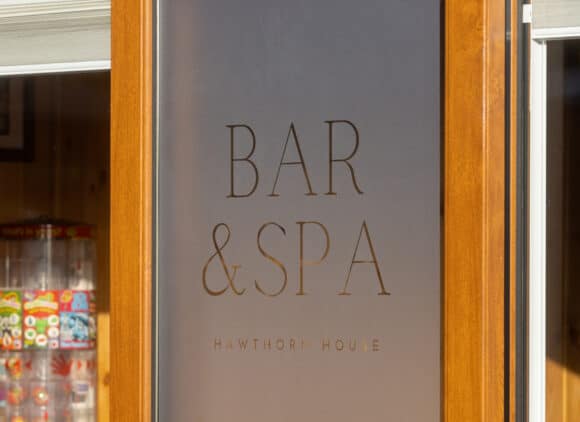 door-showing-bar-and-spa-sign